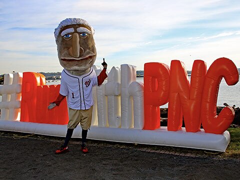 George Washington Nationals’ mascot at the PNC Parkway Classic with Run with PNC inflatable placed on the shores of the Potomac River