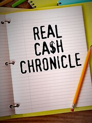 Real Cash Chronicle stamped on notebook paper