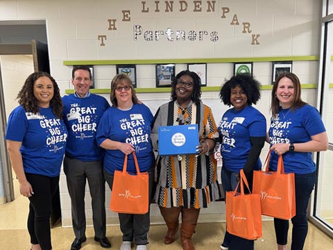 PNC employees is Columbus, OH present gifts to the Linden Park Early Childhood Education Center principal