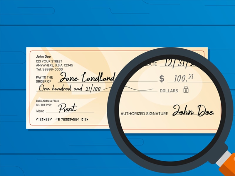 Personal check with the signature line magnified.