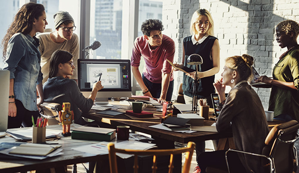 Jigsaw24 IT professionals gathered for a meeting