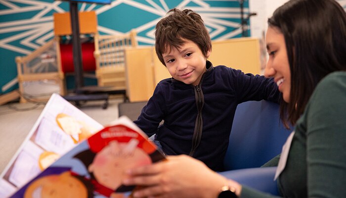 adult reading to a child